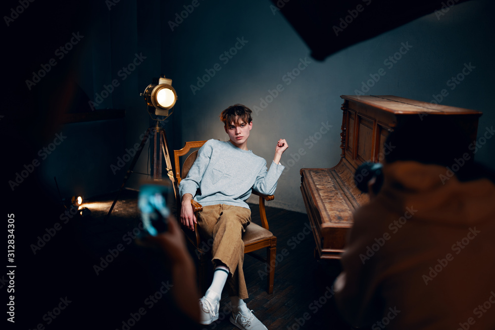 Fototapeta premium young man playing a guitar