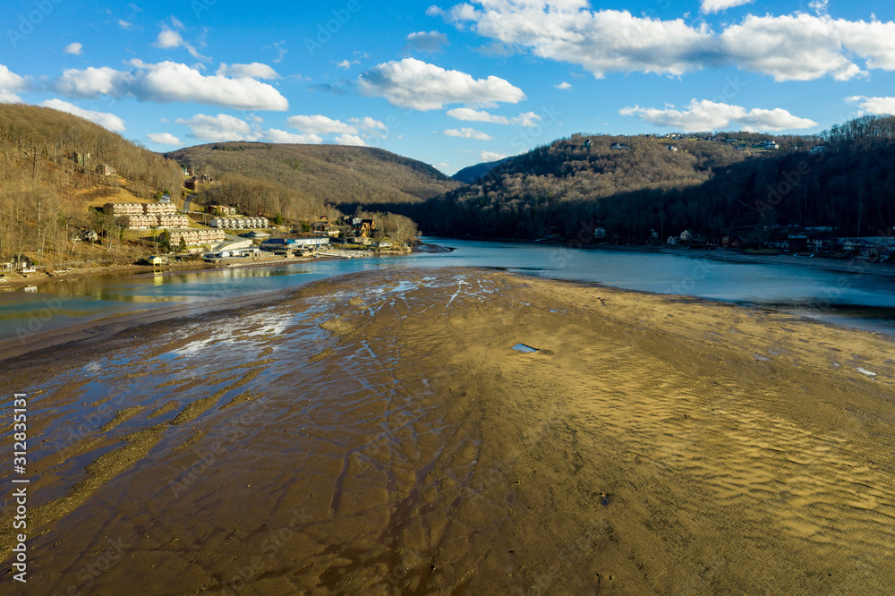 Very low water level in Cheat lake near Morgantown showing a large sand bank where the lake used to be