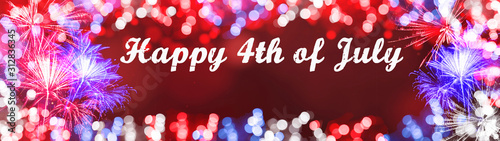 Happy 4th of July background panorama banner long - Firework on red texture with bokeh lights and space for text photo