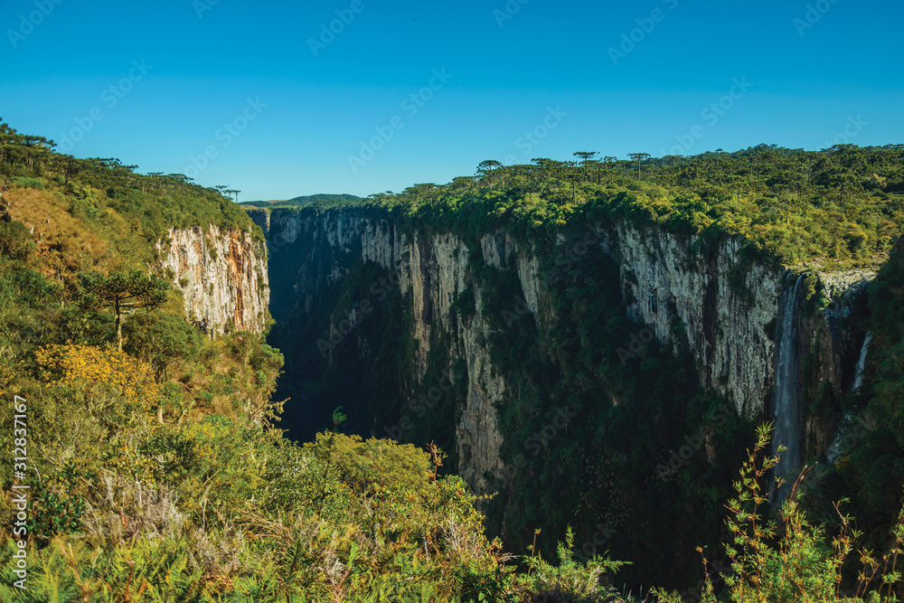 Itaimbezinho Canyon with cliffs and waterfall