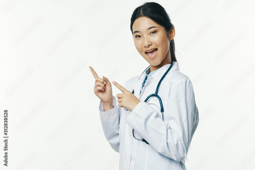 portrait of a female doctor with stethoscope isolated on white portrait of a female doctor with stethoscope isolated on white