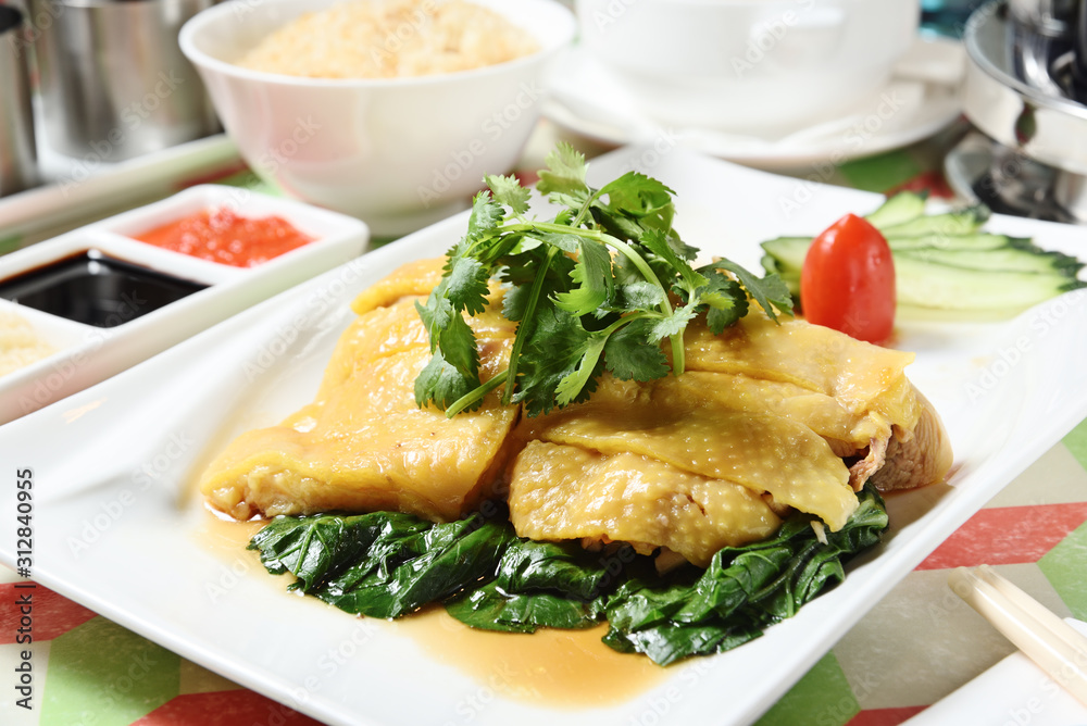 Hainanese chicken rice with sauce and soup Hainanese chicken rice with sauce and soup