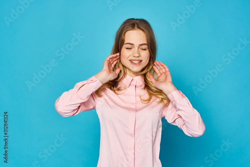 Cheerful woman in a pink shirt