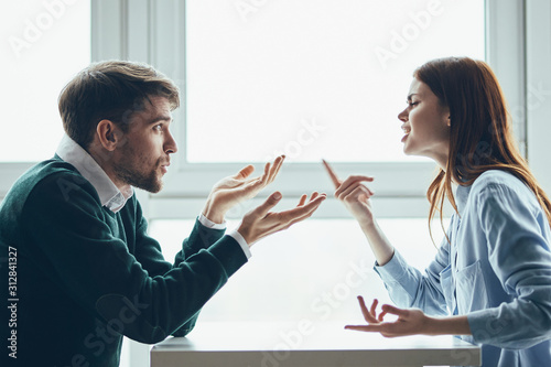 man and woman shaking hands photo