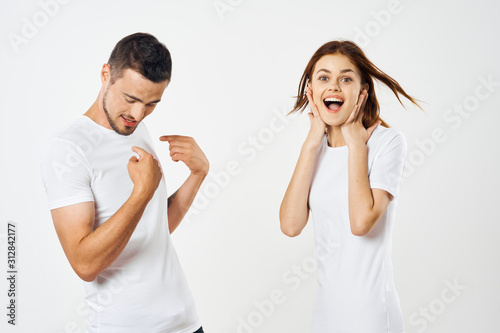 young couple in t-shirts chatting