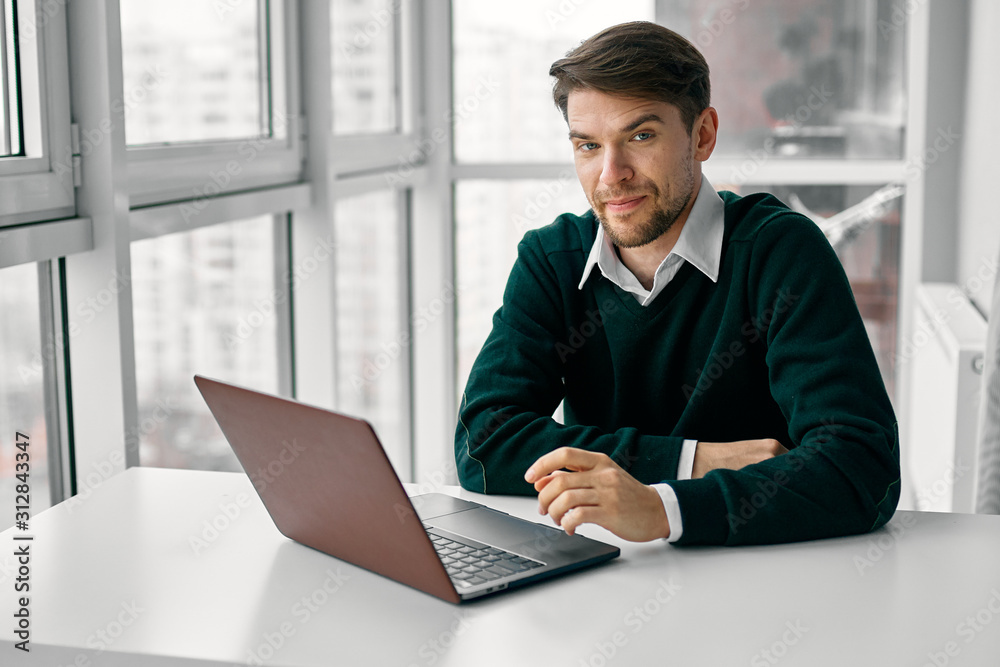 businessman working on laptop in office businessman working on laptop in office