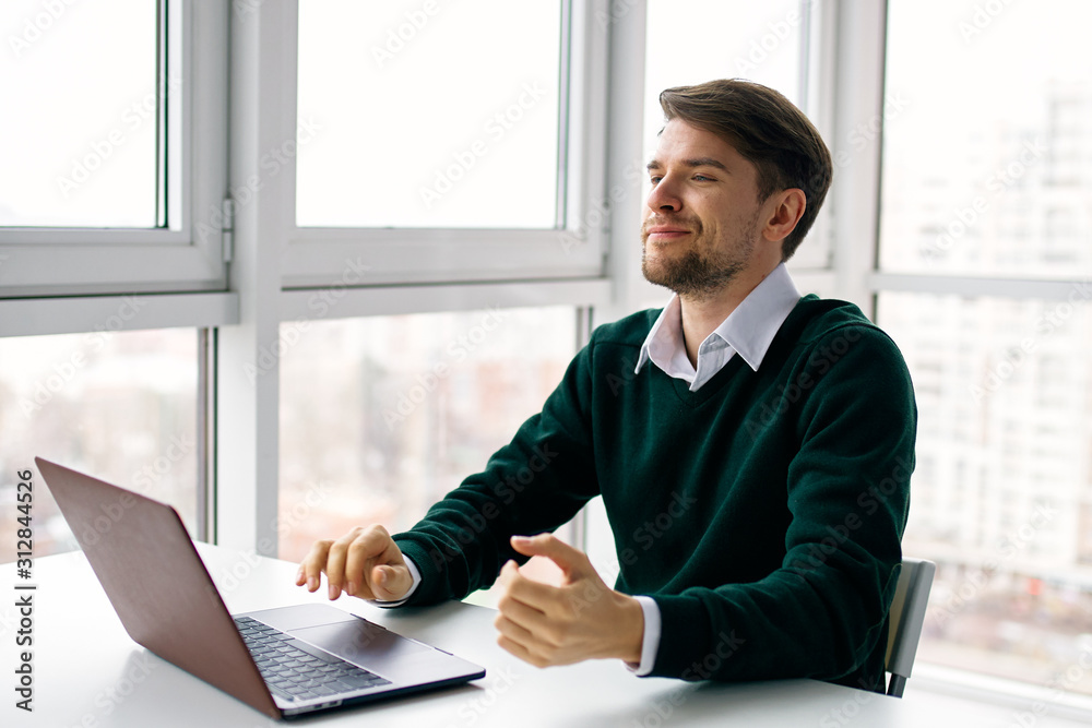 businessman working on laptop in office businessman working on laptop in office