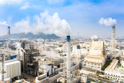 Aerial view of industrial area with chemical plant. Smoking chimney from factory