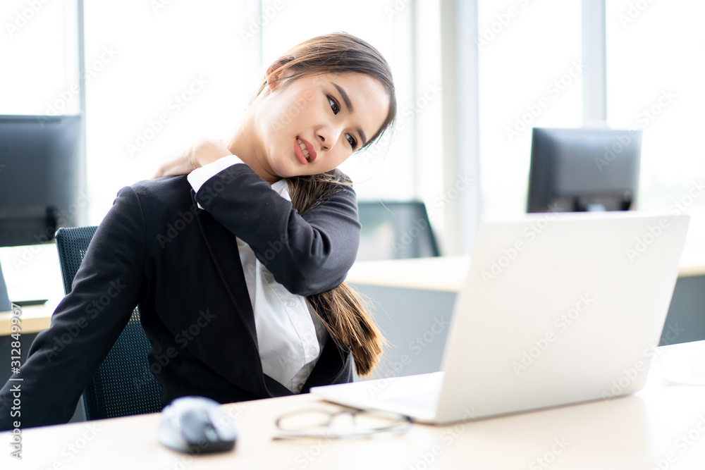 Beautiful Asian office woman having an office syndrome problem. Health problem in office and working lifestyle. Beautiful Asian office woman having an office syndrome problem. Health problem in office and working lifestyle.