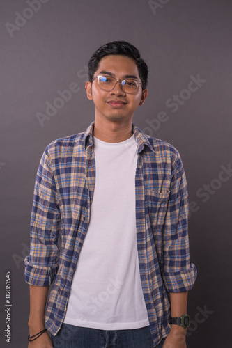 Happy of Asian boy with casual out fit.Close up shot.