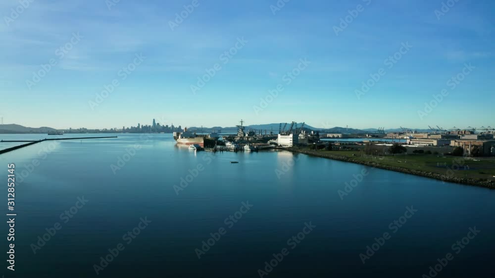 Glassy bay waters reflect the perfect blue sky. Glassy bay waters reflect the perfect blue sky.