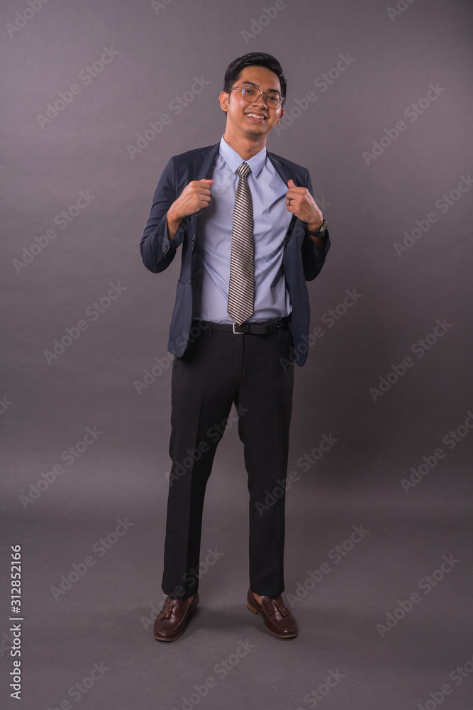 Portraiture of Young male intrepreneur or business man.Studio shot. Portraiture of Young male intrepreneur or business man.Studio shot.