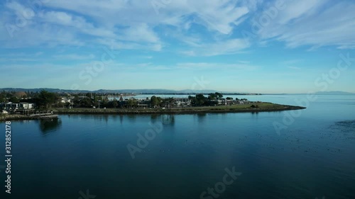 Wallpaper Mural Clods and blue skies over the waters in the sunset bay of urban cities. Torontodigital.ca