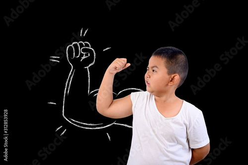 Photography The boy showed his muscle strength.