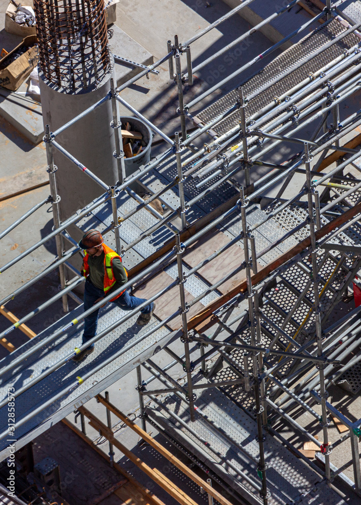 construction workers at a large building site