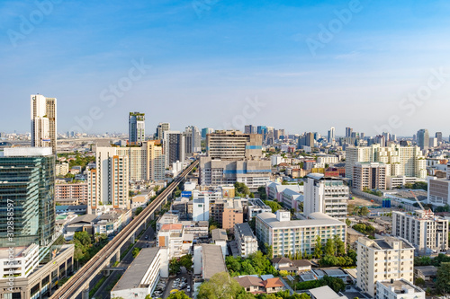 City view of the gigantic and densely populated capital of Thailand, Bangkok with its many residential and commercial skyscrapers and sprawling urban neighborhoods © Charlotte