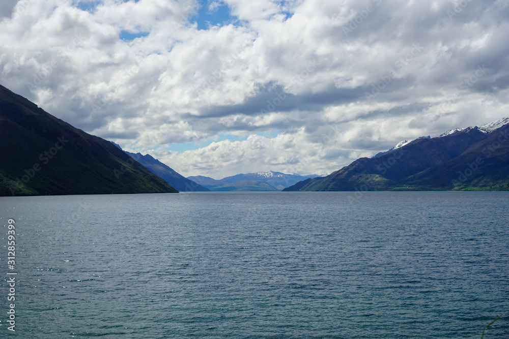 Lake, mountains, trees, sky, clouds in New Zealand