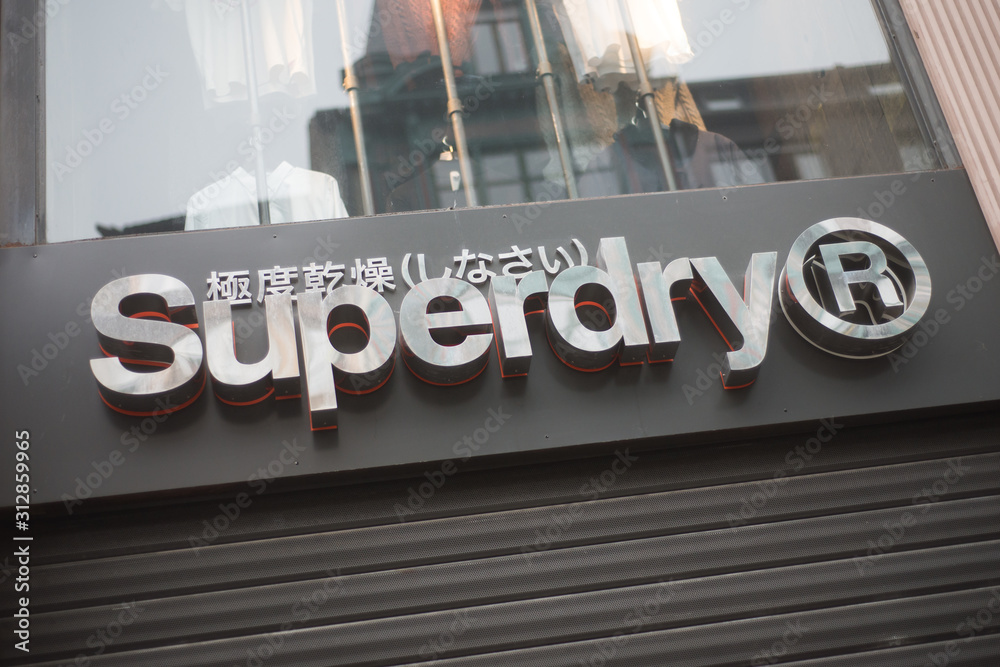 Strasbourg - France - 1 January 2020 - Closeup of Superdry logo on fashion  store front in the street Stock Photo | Adobe Stock