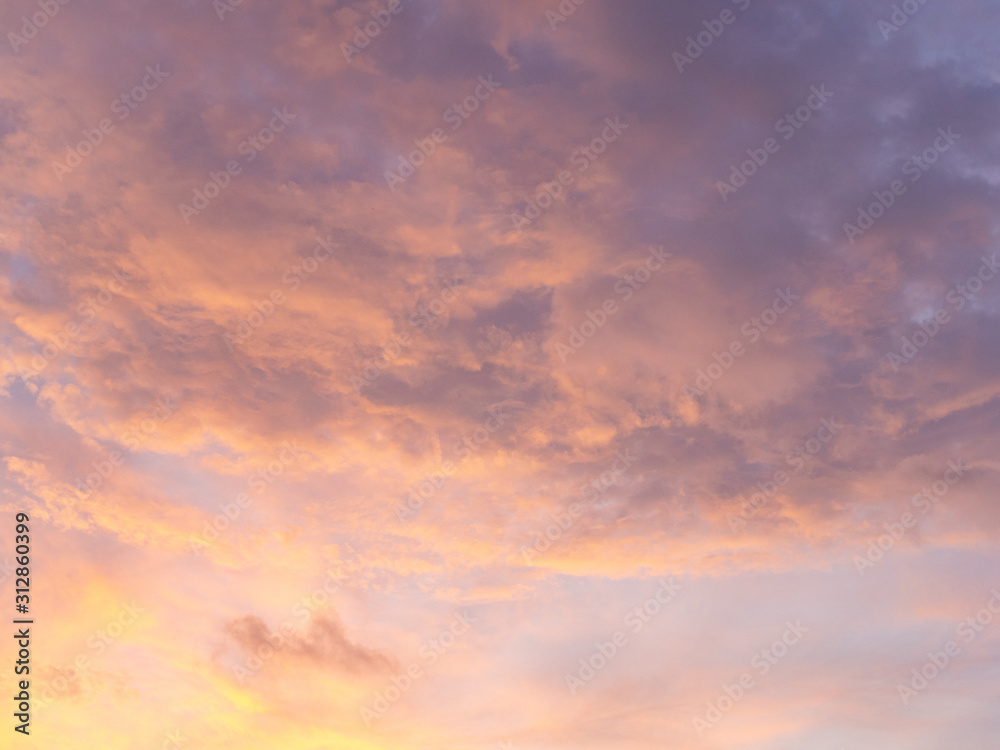 Beautiful colorful sky at sunset with cumulus clouds. Purple and pink sky wallpaper