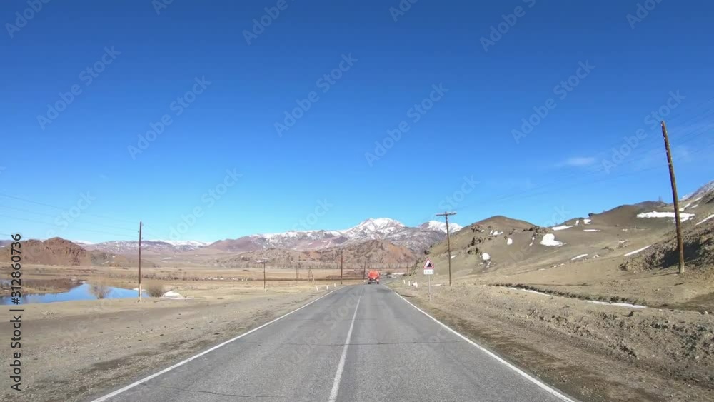 Time lapse video of driving along mountain road Chuysky Tract along Kurai Ridge and river Chuya on Altai Time lapse video of driving along mountain road Chuysky Tract along Kurai Ridge and river Chuya on Altai