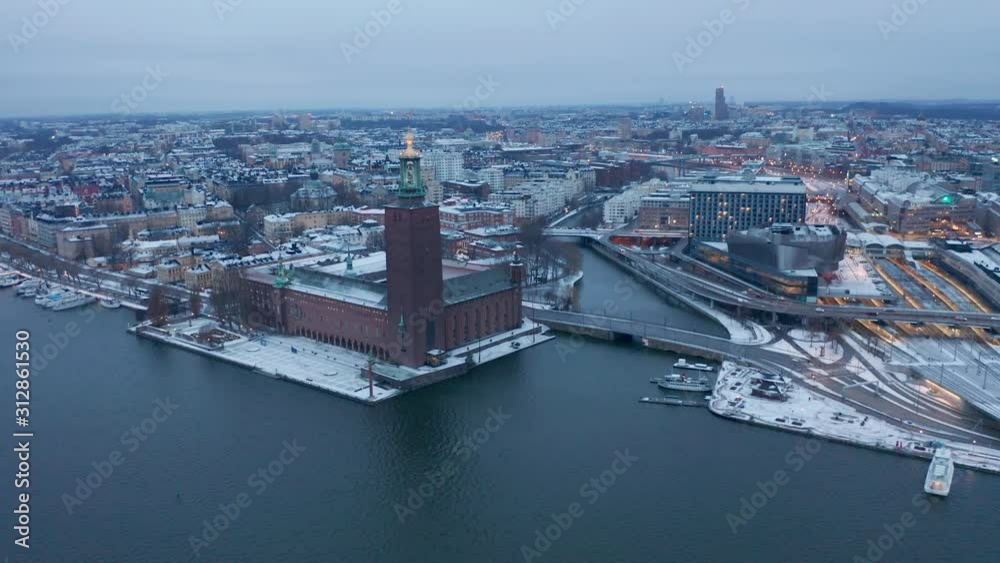 Cold winter & snowy morning in Stockholm. Aerial view of famous City Hall. Cold winter & snowy morning in Stockholm. Aerial view of famous City Hall.