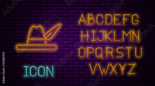 Glowing neon line Oktoberfest hat icon isolated on brick wall background. Hunter hat with feather. German hat. Neon light alphabet. Vector Illustration