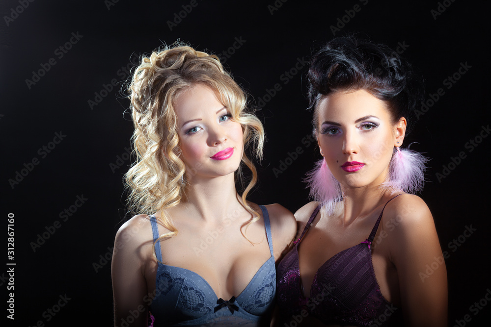 Attractive Female Models In Lingerie Posing On Dark Studio Background attractive-female-models-in-lingerie-posing-on-dark-studio-background
