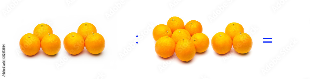 Division, simple mathematical operation; division between oranges Division, simple mathematical operation; division between oranges