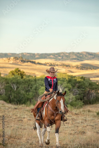 Cowgirl on Paint Horse © Terri Cage 