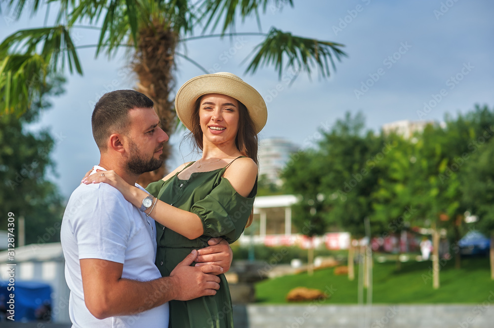 Fototapeta premium Young couple in love on vacation . Happy people in love