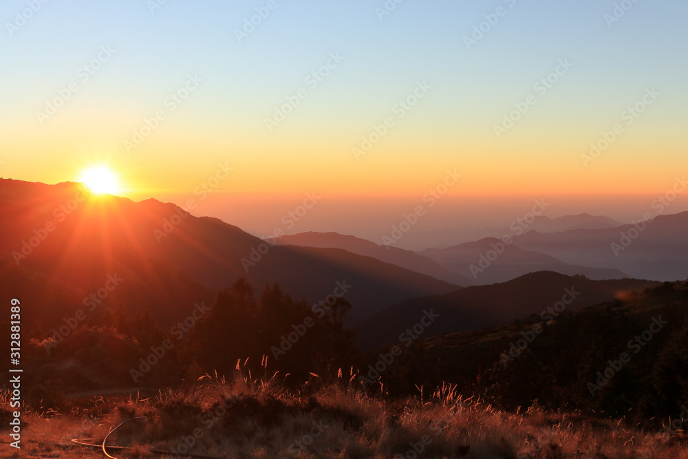 Beautiful morning fog at sunrise on the top of Poon Hill on Annapurna Circuit, Nepal Beautiful morning fog at sunrise on the top of Poon Hill on Annapurna Circuit, Nepal