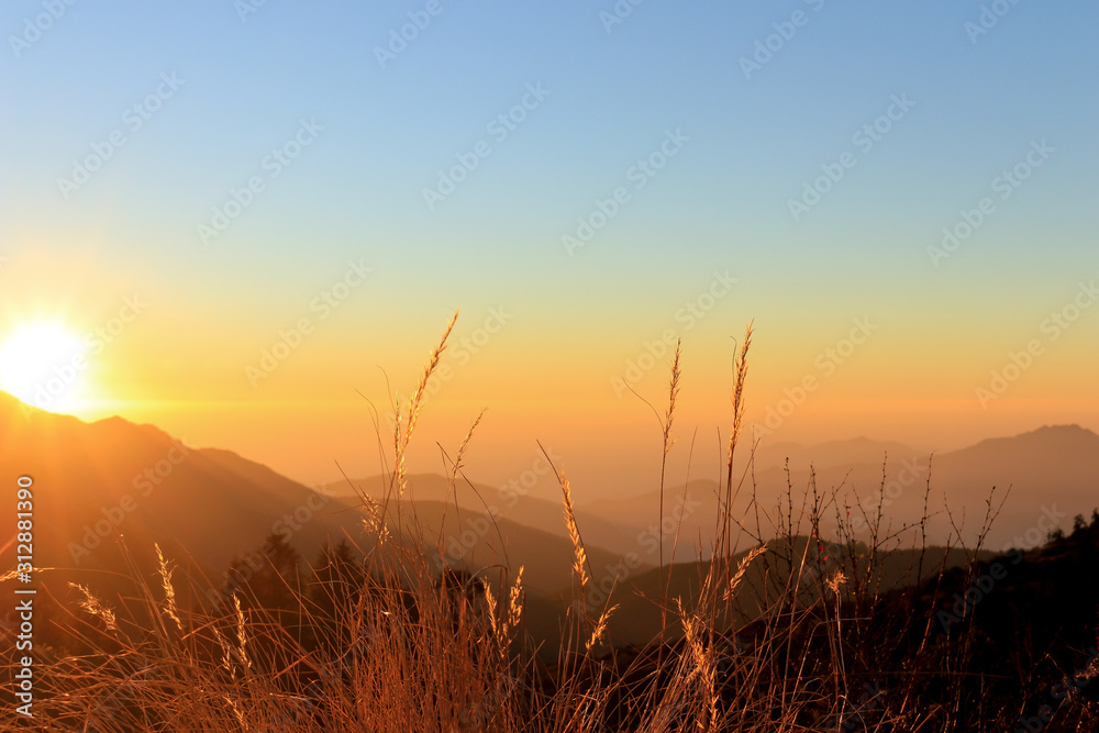 Beautiful morning fog at sunrise on the top of Poon Hill on Annapurna Circuit, Nepal 