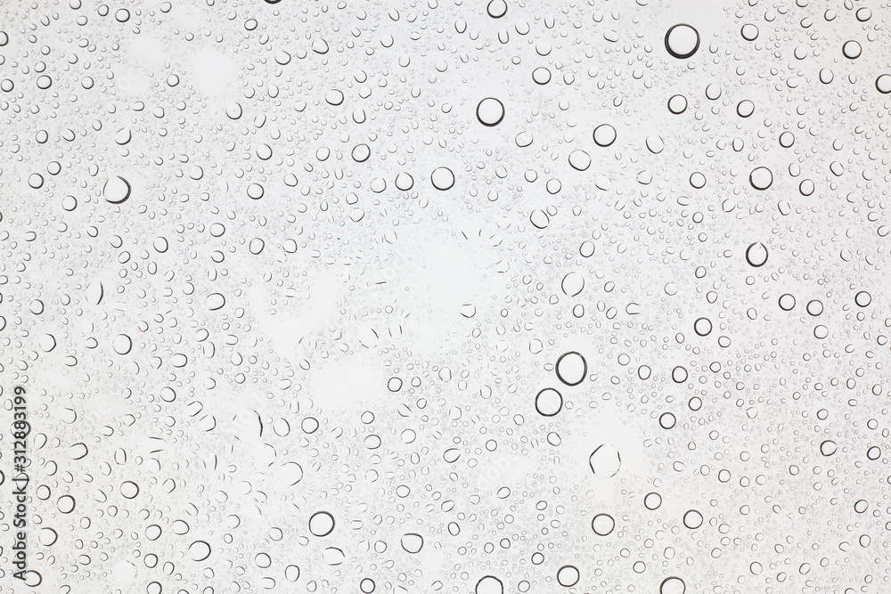 Rain droplets on glass background, Water drops on glass. Rain droplets on glass background, Water drops on glass.