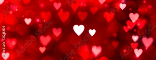Valentinstag - Abstrakter roter Hintergrund Banner - Bokeh in Herzform