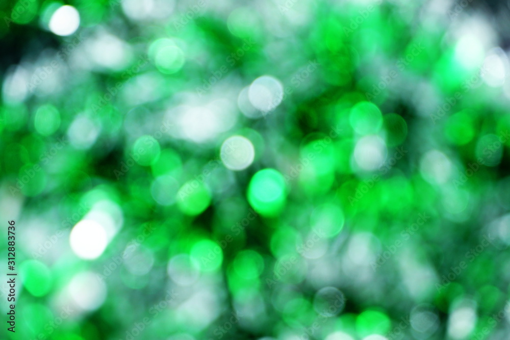 Obraz premium Abstract Green light bokeh background