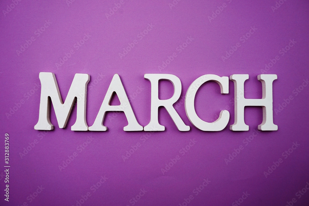 March alphabet letter with space copy on Purple background March alphabet letter with space copy on Purple background