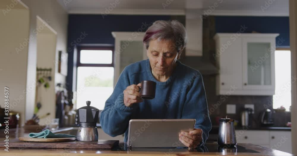 Senior woman relaxing alone at home Senior woman relaxing alone at home