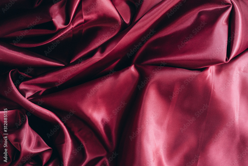 Fototapeta premium burgundy luxury fabric background with copy space