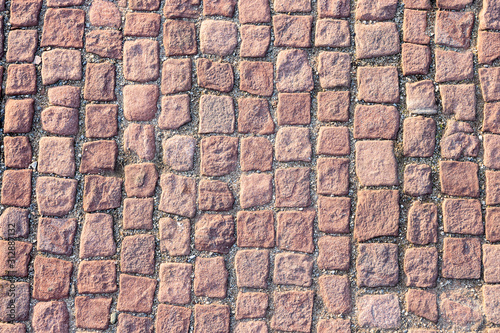Red pavement pattern background shot from above