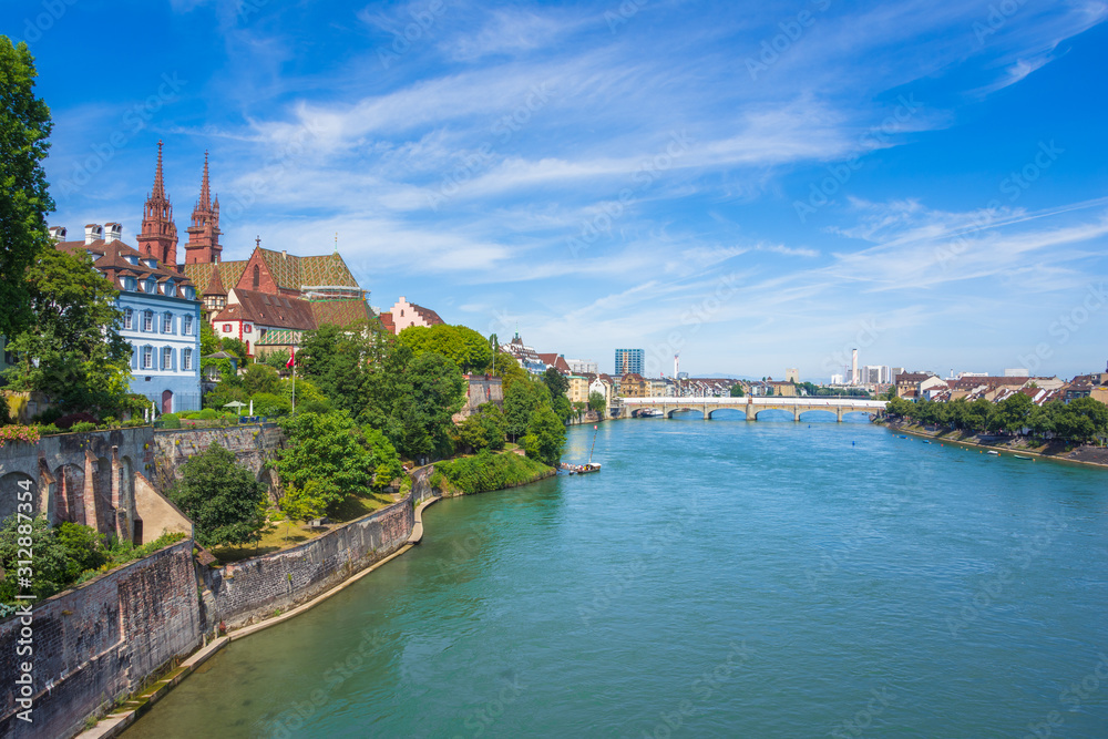 Old Town of Basel with red stone Munster cathedral and the Rhine river, Switzerland.