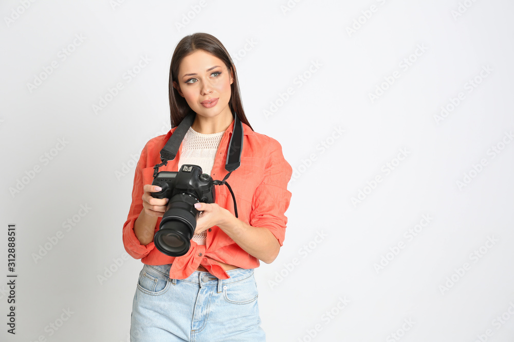 Professional photographer working on white background in studio Professional photographer working on white background in studio