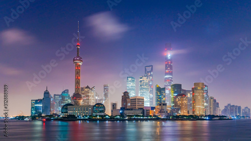 Shanghai skyline and skyscraper, Shanghai modern city in China on the Huangpu River. © Kalyakan