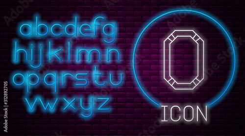 Glowing neon line Poker table icon isolated on brick wall background. Neon light alphabet. Vector Illustration