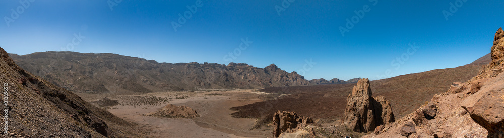 Naklejka premium Panoramic view of El Teide volcanic crater, ultra wide with copy space.