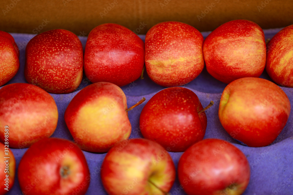 A bunch of whole ripe apple in fruit market A bunch of whole ripe apple in fruit market