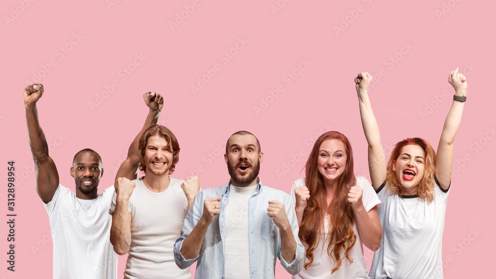 Portrait of multiethnic group of young people isolated on pink studio background, flyer, collage. Concept of human emotions, facial expression, sales, advertising. Celebrating, winning, happy. - obrazy, fototapety, plakaty 