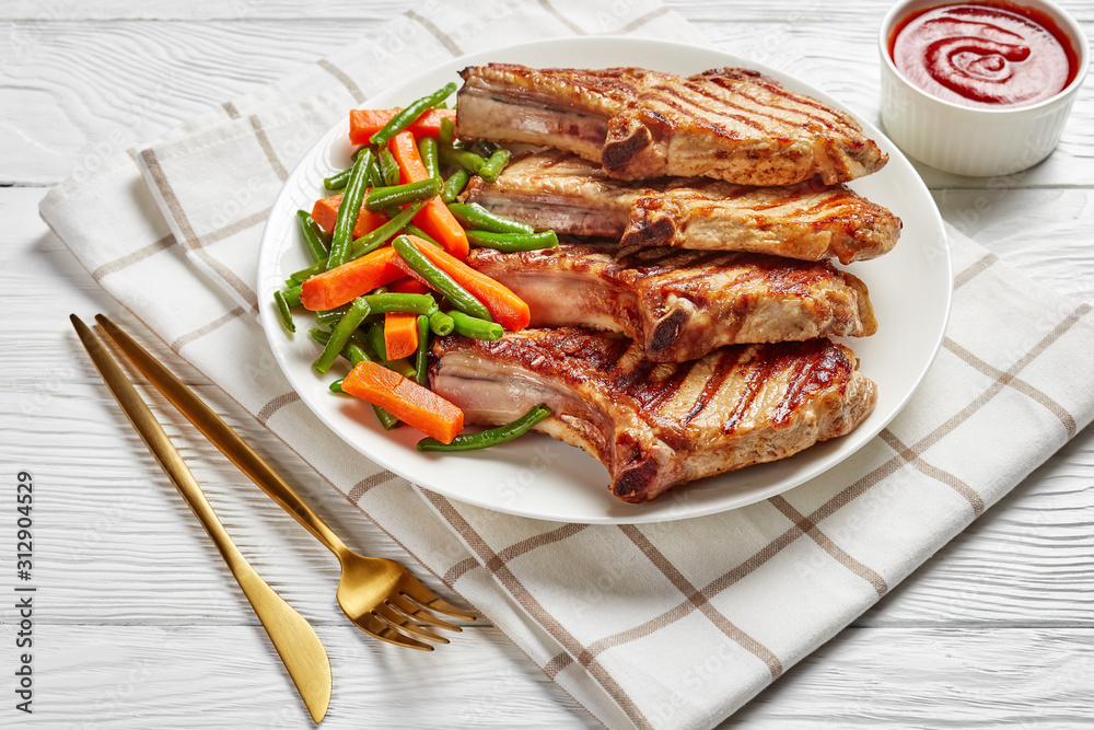 close-up of Grilled pork chops, horizontal view
