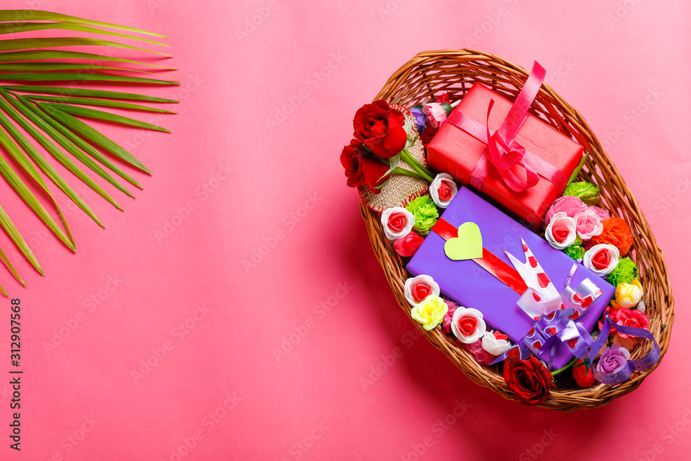 Gift box,red rose flower in wooden basket. Valentine day concept 