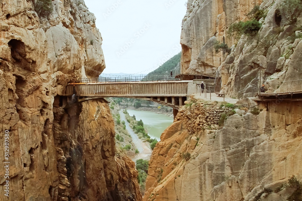 Caminito del Rey hiking trail through a deep narrow gorge. Malaga Spain