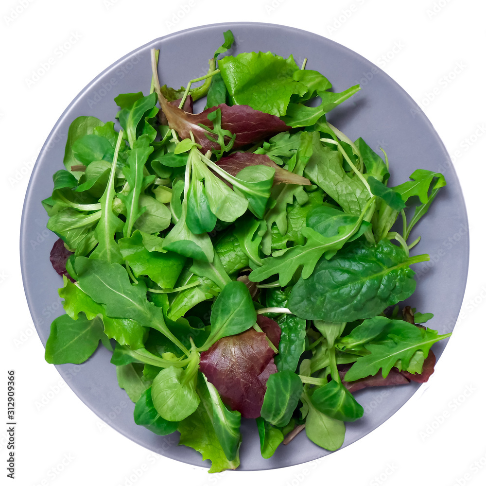 Fresh green mixed salad with spinach, rucola, romaine and lettuce, on white background, top view. Fresh green mixed salad with spinach, rucola, romaine and lettuce, on white background, top view.